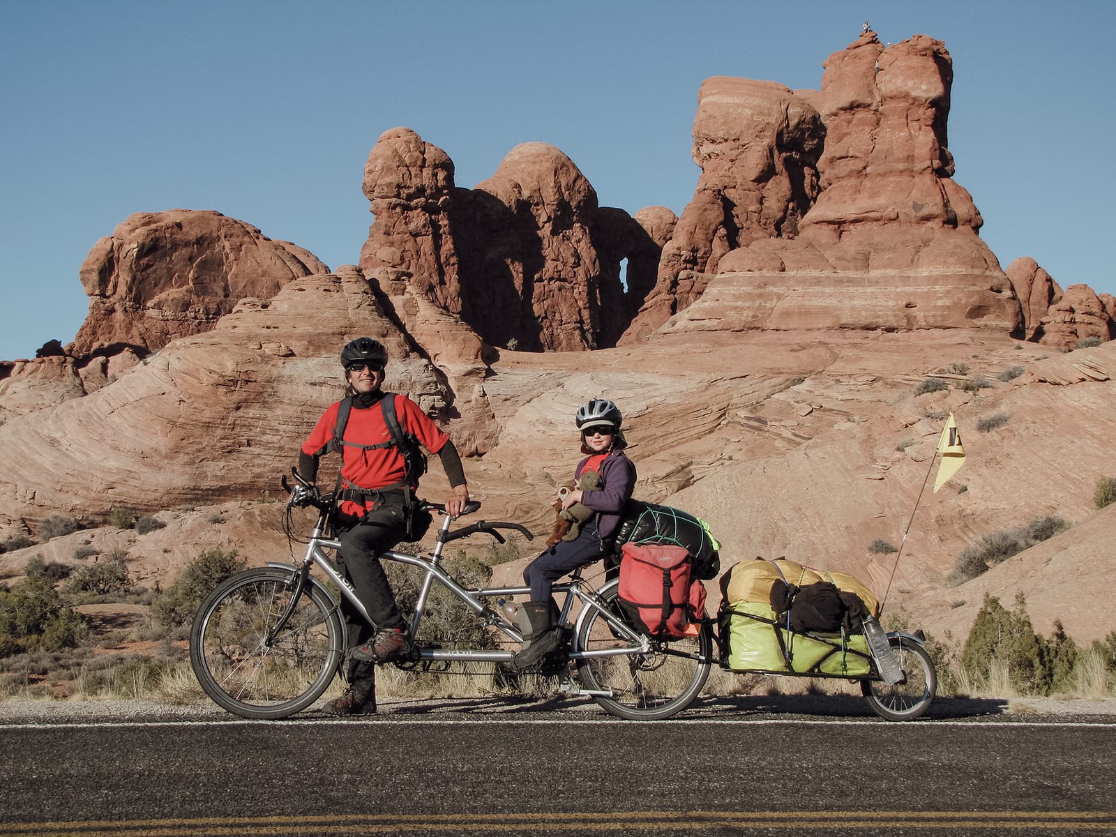 Father and daughter riding a tandem bicycle across America 