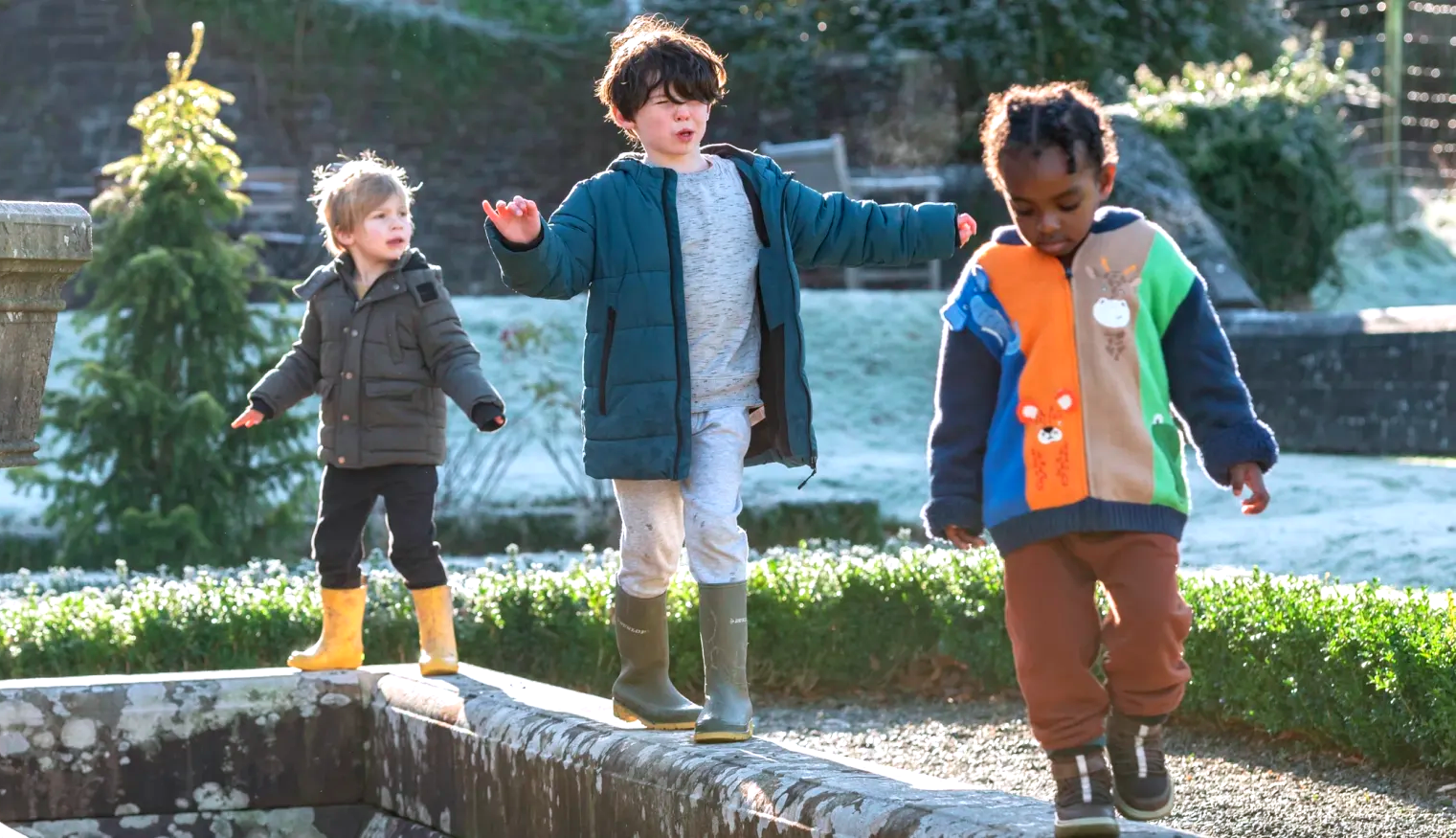 Children exploring the formal garden at Dinefwr