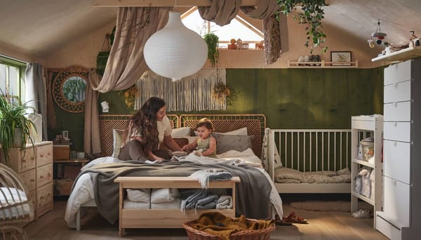 Photograph by IKEA of a family bed and space designed to suit the needs of a young family